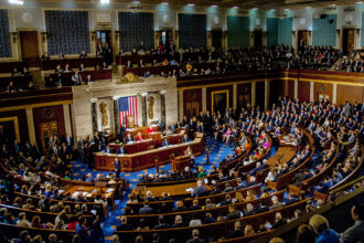 A photo of the main chamber of the United States House of Representatives, full of lawmakers.